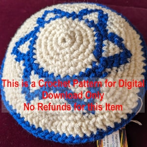 May include: A handmade crochet pattern for digital download. The item is a white and blue crocheted cap with a star-like design. The text on the image reads: "This is a Crochet Pattern for Digital Download Only. No Refunds for this Item."