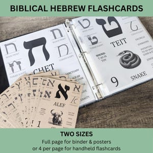 May include: A set of Biblical Hebrew flashcards displayed in a three-ring binder and as loose cards. The pages feature large black Hebrew letters, including Chet and Teit, with corresponding block print, cursive, and Torah script styles, plus illustrations like a snake.