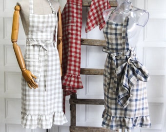 Linen apron with ruffled hem and lace details with kitchen towel, blue linen kitchen dress with frills, vintage bakery cafe red checks apron