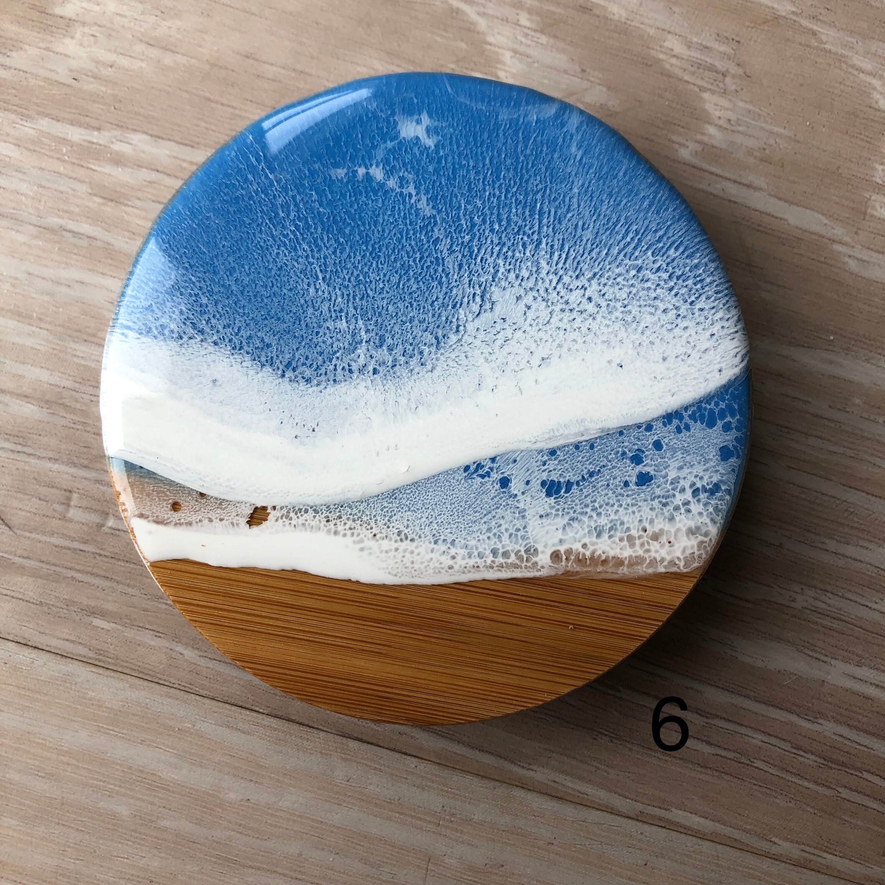 Tall resin wave glass container