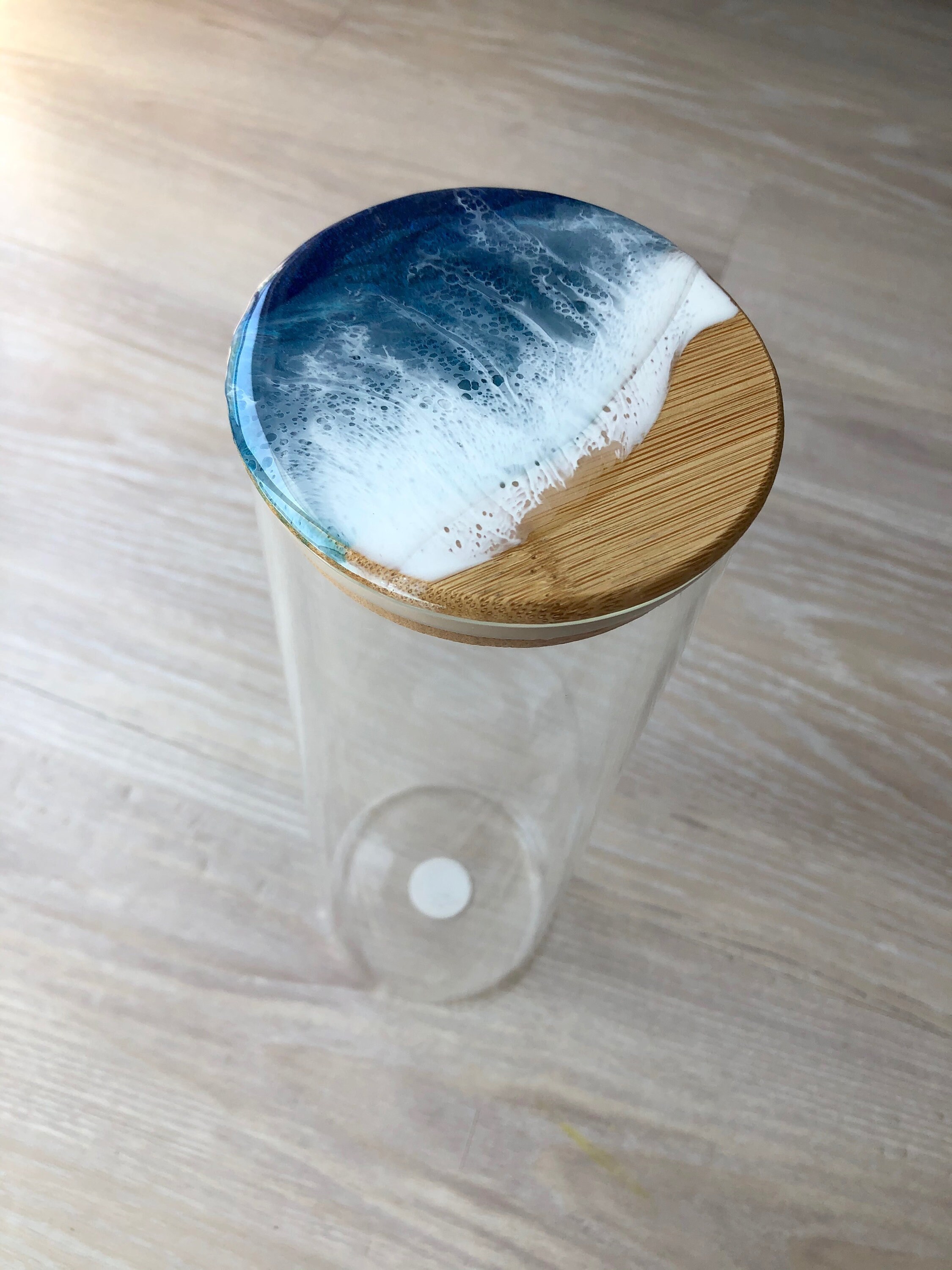 Glass container with bamboo lid