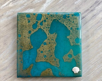 Resin coral reef coaster with seashell