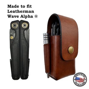May include: A black Leatherman Wave Alpha multi-tool and a brown leather sheath with a snap closure. The sheath has a separate pocket for a flashlight or other tool. The text "Made to fit Leatherman Wave Alpha" is visible.