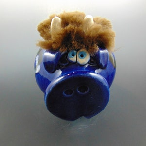Blue Piggy Bank with Brown Fuzzy Hair