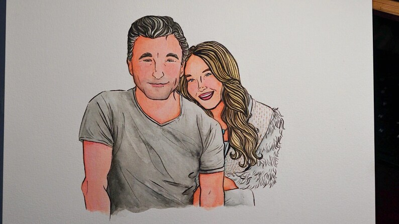 May include: A watercolor illustration of a couple. The man is wearing a gray t-shirt and the woman is wearing a white fur jacket. They are both smiling.