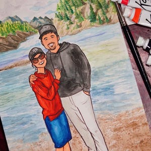 May include: Watercolor painting of a couple standing in front of a river and mountains. The woman is wearing a red sweater and blue skirt, and the man is wearing a black hoodie and white pants.