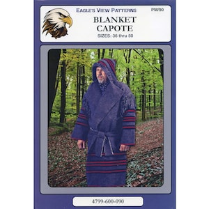 May include: A sewing pattern for a hooded blanket capote, with a model wearing the finished garment in a forest setting. The pattern is called "Blanket Capote" and is from Eagle's View Patterns. The pattern is for sizes 36 through 50. The pattern number is 4799-600-090.