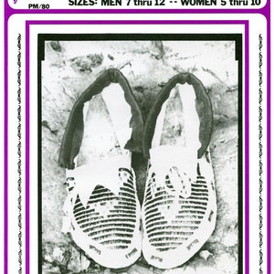 May include: Black and white image of a pair of moccasins. The moccasins are made of leather and have a beaded design. The image is from a pattern book for making moccasins. The text on the page reads "Plains Indian Moccasin Pattern" and "Sizes: Men 7 thru 12 - Women 5 thru 10".