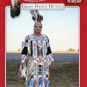 May include: A man wearing a traditional Grass Dance outfit with intricate beadwork and colorful fringe. The outfit is white with blue, red, and yellow accents. The man is wearing a headdress with feathers and a mask. The outfit is made by Missouri River, a brand known for its high-quality craftsmanship.