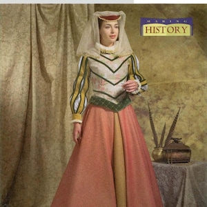 May include: A historical costume pattern by Butterick. The image shows a woman wearing a Renaissance-style dress with a bodice, long sleeves, and a full skirt. The dress features a cream-colored bodice with green and black accents, and a red and gold skirt. The text "MAKING HISTORY" is visible.