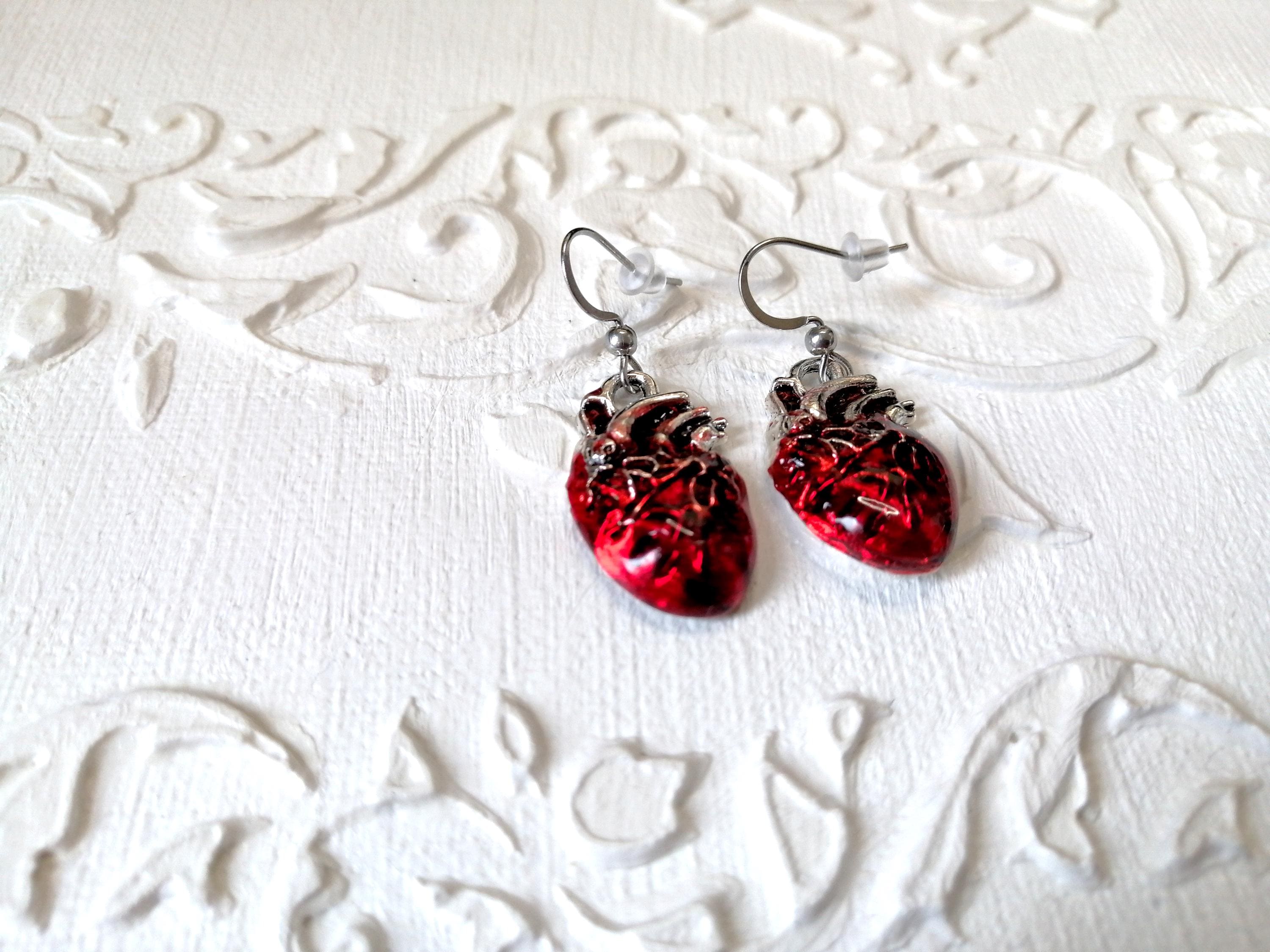 Boucles d'oreilles anciennes en or victorien avec noeud d