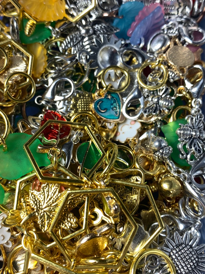 A completely random assortment of colorful  metal, enamel, and acrylic stitch markers