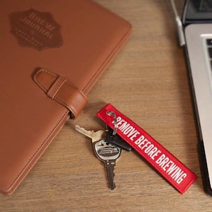 REMOVE BEFORE BREWING Keychain. A unique gift for craft beer lovers and home brewers.