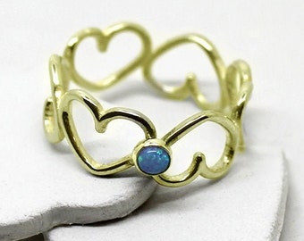 14k gold Heart Ring with a gem.