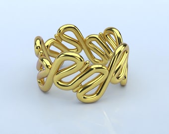 May include: A gold-colored ring with a repeating, openwork design. The ring features a series of interconnected, stylized loops, creating a continuous pattern around the band. The ring is displayed on a white surface.