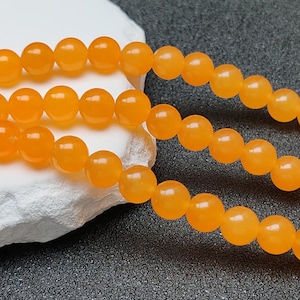 Grade A Natural Orange Jade Beads 6mm 8mm 10mm 12mm 14mm Smooth Polished Round 15 Inch Strand JA45 Wholesale Gemstone Beads