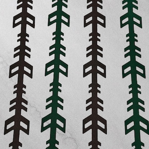 May include: A repeating pattern of vertical lines with an arrow-like design. The arrows alternate between dark brown and forest green, set against a light gray, textured background. The design is symmetrical and geometric.
