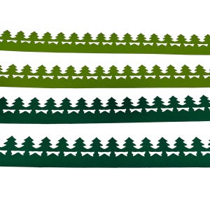May include: Four horizontal strips of green paper with a repeating tree design cut out along the top edge. The shades of green vary from light to dark, creating a layered effect. The background is plain white.