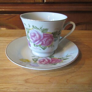 China Tea Cup and Saucer , Purple Floral with gold trim , cup and Saucer made in China #C-53