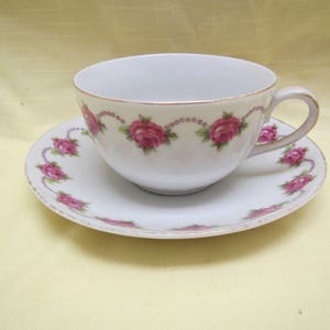 White with Roses Tea Cup and Saucer  ,  Germany ( C-22 )