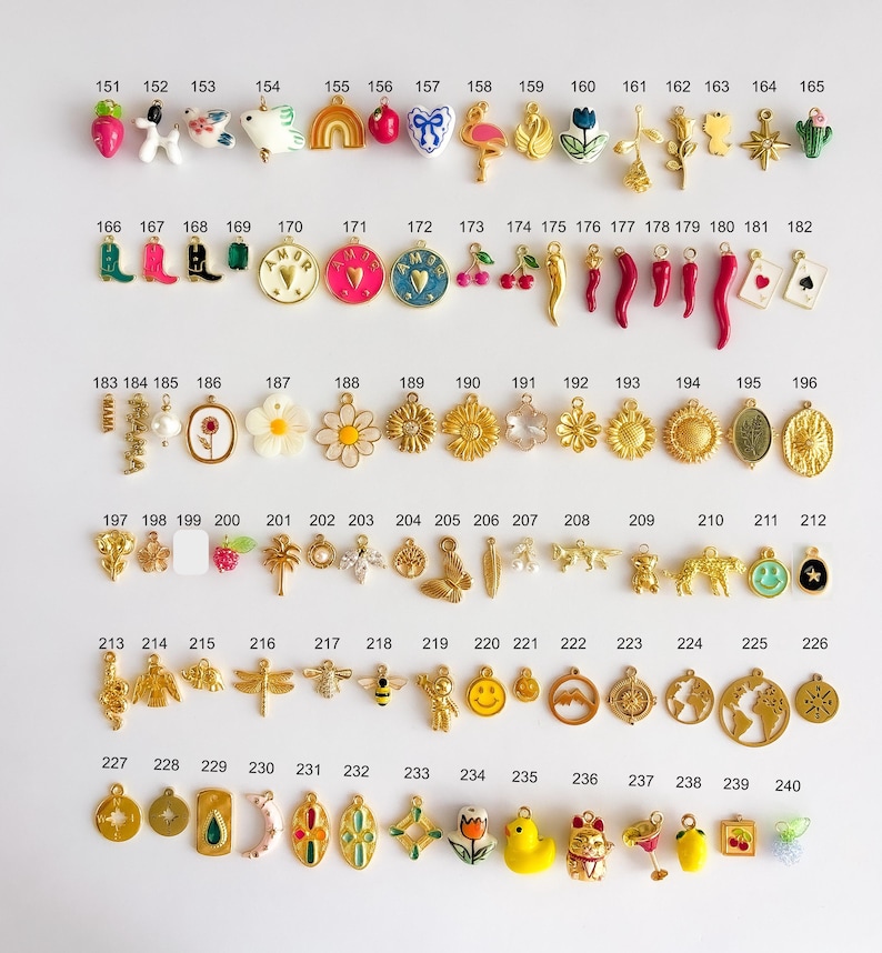 May include: A collection of small metal and enamel charms arranged in rows, numbered 151 through 240. The charms feature various shapes including animals, flowers, food items, symbols, and geometric designs in gold, silver, and vibrant colors.