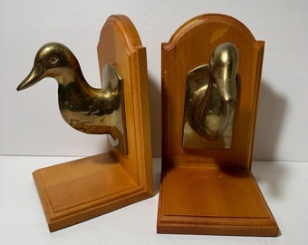 Vintage Brass Wood Duck Head Book Ends. Great city traders.