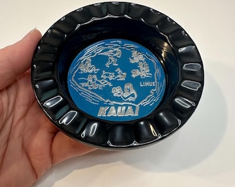 Vintage blue metal Kauai Hawaii ashtray. State travel souvenir.