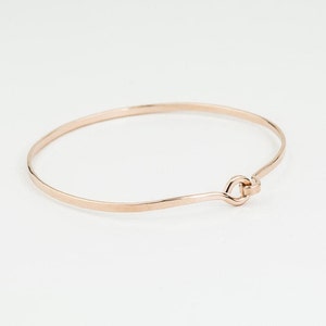 thin 14K rose gold fill bangle bracelet with hook and eye enclosure system