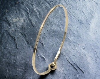 Thin 14K Gold Bangle Bracelet with a Polished Finish, Great for Stacking