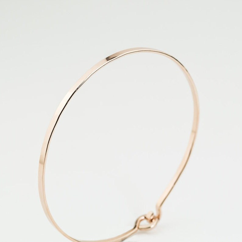 thin stackable rose gold fill bangle bracelet with hook and eye enclosure system