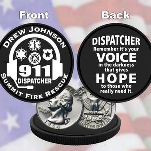 May include: Black and white challenge coin with the text "Drew Johnson Summit Fire Rescue" and "911 Dispatcher" on the front. The back of the coin has the text "Dispatcher Remember it's your voice in the darkness that gives hope to those who really need it."