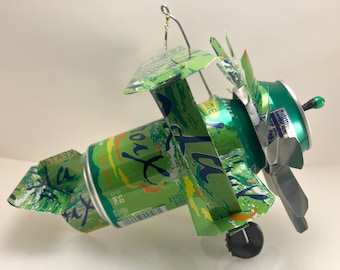 Airplane Whirl-A-Gig Made From La Croix Key Lime Sparkling Water Cans