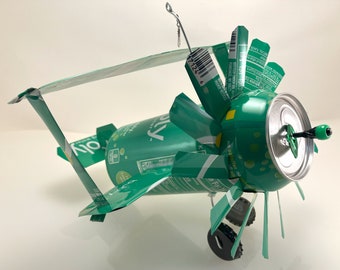Airplane Whirl-A-Gig Made From Lime Bubly Sparkling Water Cans