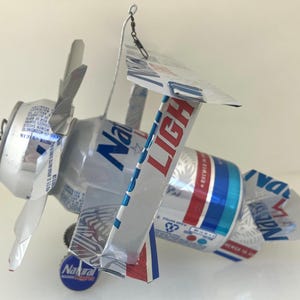 Airplane Whirl-a-Gig Made From Older Natural Light Beer Cans