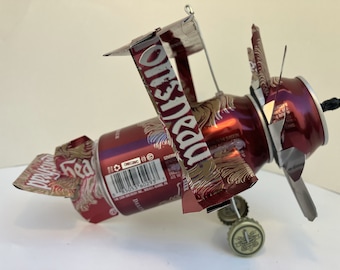 Airplane Whirl-a-Gig Made From Lions Head Deluxe Pilsner Beer Cans