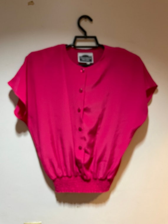 Pink 80s sleeveless top