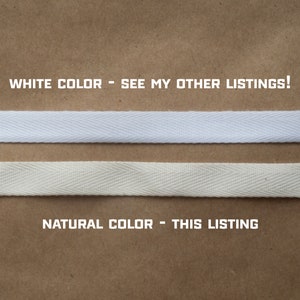 May include: Two samples of cotton twill tape, one white and one natural. The white tape is labeled "WHITE COLOR - SEE MY OTHER LISTINGS!" and the natural tape is labeled "NATURAL COLOR - THIS LISTING".