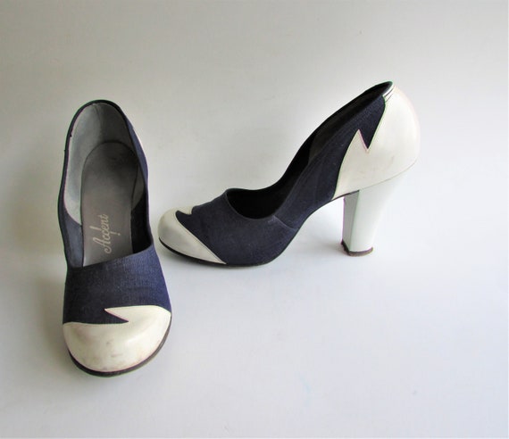 women's navy and white spectator pumps