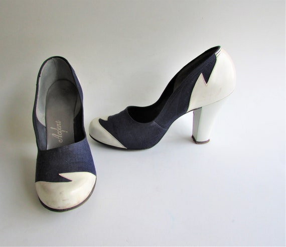 navy spectator pumps