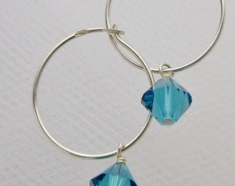 Sterling Silver Hoop Earrings with Capri Blue Swarovski Crystal Dangles. Blue Swarovski Crystal Earrings