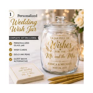 May include: A clear glass jar with a lid, featuring gold text that reads A JAR FULL OF Wishes FOR THE Mr. and the Mrs. JESSICA & MICHAEL MAY 24, 2025. The set includes a stack of square cards with gold borders and three gold pens on a surface.