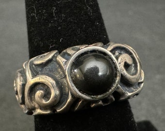 Unique Sterling Silver Marked 925 Ring. Size is 7 1/2.