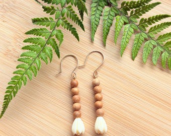 Gold Earring: Pikake dangles with tiny sandalwood beads