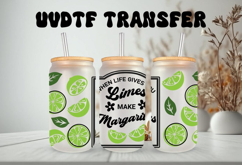 May include: Three frosted glass tumblers with bamboo lids and straws. The tumblers have a lime and leaf design. One tumbler has the text "When life gives you limes make margaritas".
