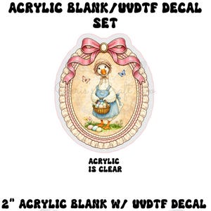 May include: An acrylic blank with a UVDTF decal set. The image features a cartoon goose wearing a bonnet and apron, holding a basket of Easter eggs. The design is framed by a pink ribbon and lace border. The text "ACRYLIC IS CLEAR" is also visible.