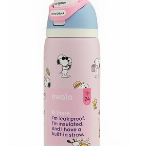 May include: Pink insulated water bottle featuring Snoopy and friends illustrations. The bottle has a blue and pink lid with a push button and the text "Hi there. I'm leak proof. I'm insulated. And I have a built-in straw."