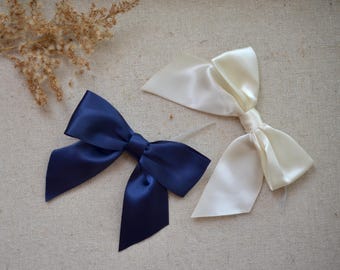dark navy or light ivory 1 1/2" satin bows