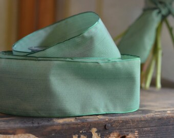 27 yard roll of 2 1/2" bright sage green taffeta french wired ribbon