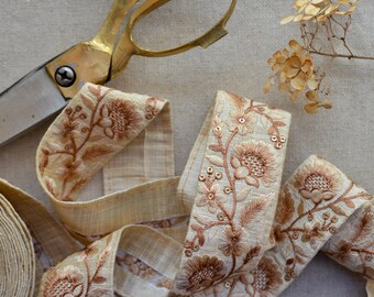 embroidered cinnamon bronze and faded butter cream floral trim