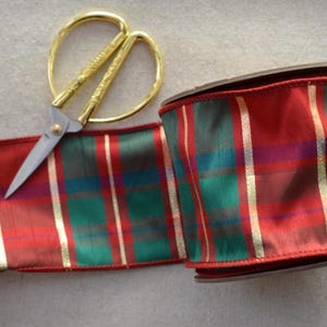 10 yard roll of 4&quot; wide red, green and gold wired ribbon